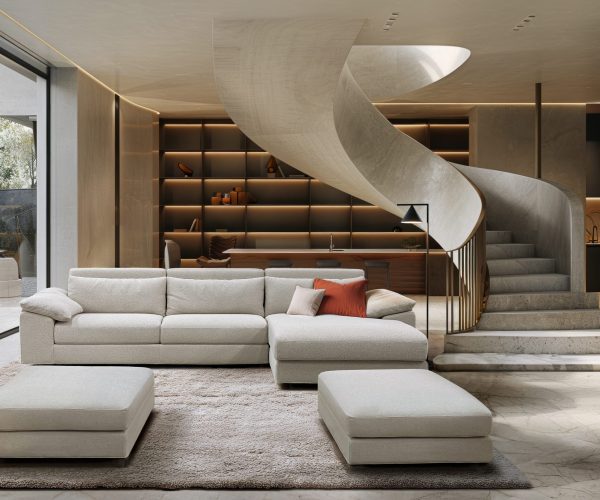A spacious living room featuring a prominent spiral staircase, adding an architectural focal point to the room.