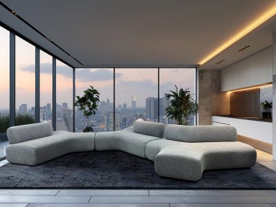 A typical living room with a couch positioned in front of a cozy fireplace, creating a warm and inviting atmosphere.